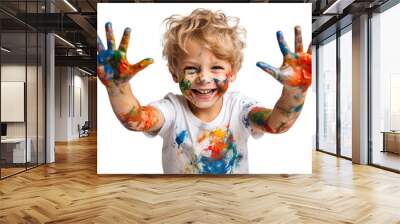 A small child artist showing paint on his hands after painting Wall mural