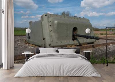 Concreted Sherman M4 tanks along river IJssel, to protect the Netherlands against russian attacks after World War 2 Wall mural