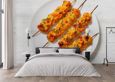 Bang Bang Chicken Skewers on plate, top view Wall mural