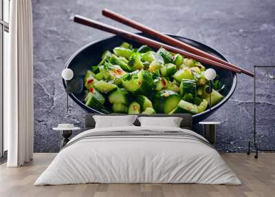 Chinese Smashed Cucumber salad in a black bowl Wall mural