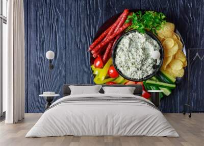 Creamy spinach dip in a black bowl Wall mural