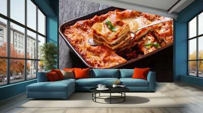 portion of Lasagna in baking dish, top view Wall mural