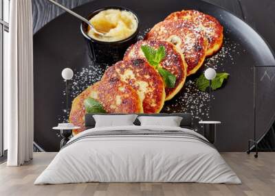 quark Potato pancakes on a black plate Wall mural