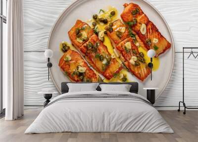 salmon piccata with lemon caper sauce on plate Wall mural