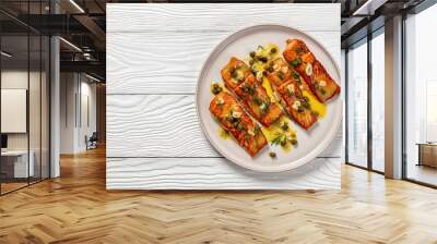 salmon piccata with lemon caper sauce on plate Wall mural