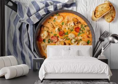 seafood saute in a pan, top view Wall mural