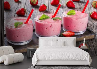 Strawberry Banana Smoothies Cups with straws and mint leaves Wall mural