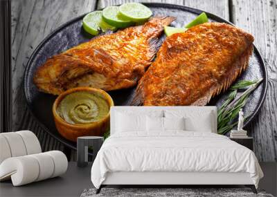 two fried ocean perch with rosemary and lime Wall mural