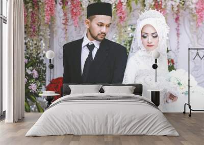 Muslim marriage. Romantic wedding muslim couple during the marriage ceremony Wall mural