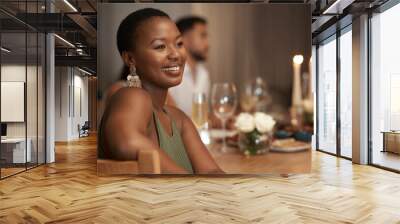 Dinner, party and thinking with a black woman at a table in celebration of the new year or a birthday. Event, idea and social with a young female sitting in a home or house for the festive season Wall mural