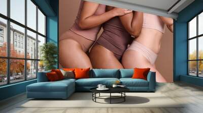 Diversity, body positive and woman in underwear for skincare beauty, dermatology wellness and self care support in studio. Interracial lingerie model, body care and natural glow or female solidarity Wall mural