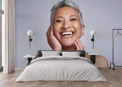 Skincare, makeup and senior woman excited about facial health, wellness and beauty against a grey mockup studio background. Smile, happy and face portrait of an elderly model for dermatology Wall mural