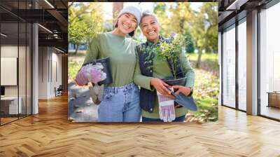 Plants, trees and garden people in portrait for community service, earth day collaboration and eco friendly project. Gardening, growth and happy women in teamwork, spring environment and nature park Wall mural