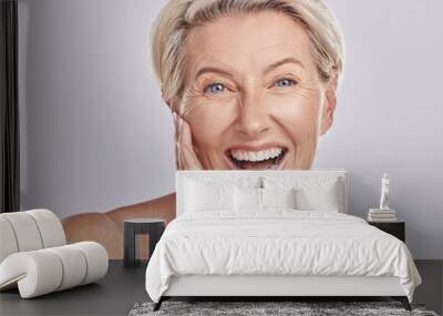 Skincare, beauty and wellness for mature skin, self care and body cosmetic of a happy, smile and healthy woman in studio. Portrait of excited, happy and smile model with clean face and complexion Wall mural