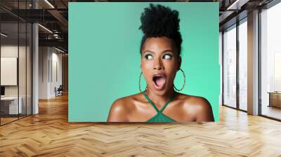 Surprise, trendy black woman and green studio background portrait with wow secret and style. Fashion and african american female makeup girl with deal, discount and gossip smile with mockup space Wall mural