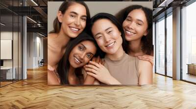 Women, portrait and beauty, diversity and happy with wellness, dermatology and friends isolated on studio background. Unique skin, natural cosmetics and inclusion with skincare, smile and antiaging Wall mural