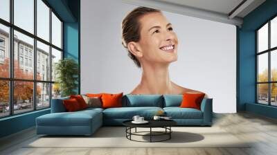 Skincare, face and portrait of model woman with smile for facial, health and skin for mockup in studio background. Cosmetics, happy and senior female with beauty, wellness and cosmetic makeup care. Wall mural