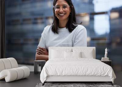 Woman, smile and outside on balcony with arms crossed for happiness in portrait with pride for company. Glasses, designer and employee with outdoor office for relax on break in urban town in New York Wall mural