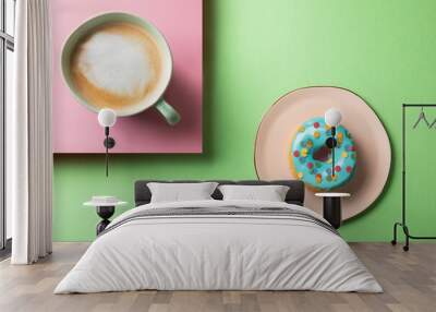 Doughnut and cup of coffee with milk, top view Wall mural