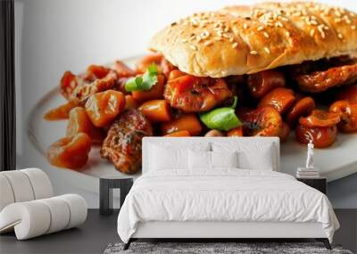 Sesame seed bun with glazed meat and vegetables on a white plate. Wall mural