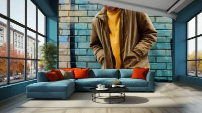 Photo of a young fashion stylish trendy look man model  in color clothes modern style outdoor street style  natural light Wall mural