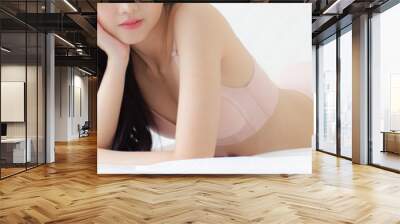 Beautiful young asian woman sexy in underwear figure fit relax in bedroom, asia girl body slim in lingerie confident and happy lying on bed in bedchamber, lifestyle concept, banner website.. Wall mural