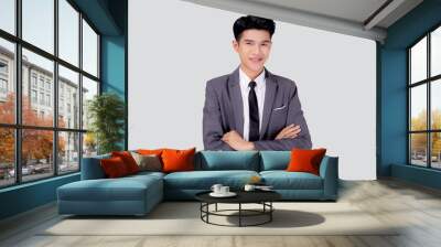 Portrait businessman in suit with crossed his arms standing isolated on white background, young asian business man is manager or executive having confident is positive with success. Wall mural