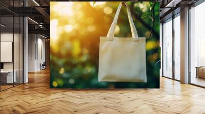 Mockup of a plain white fabric tote bag set against a nature-inspired background, perfect for eco-friendly and sustainable lifestyle promotions Wall mural