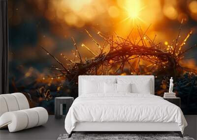 Crown of thorns with golden halo on sunset background  Wall mural