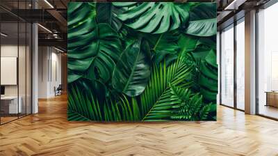 closeup nature view of green leaf and palms background. Flat lay, dark nature concept, tropical leaf Wall mural