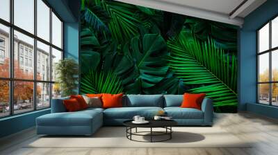 closeup nature view of palms and monstera and fern leaf background. Flat lay, dark nature concept, tropical leaf. Wall mural