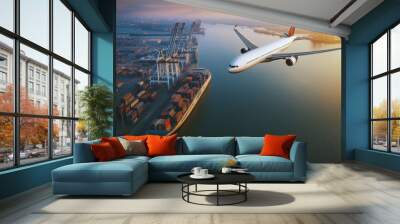 Airplanes fly over warehouses and ports, representing the logistics system in air transport, using advanced systems to improve efficiency in air cargo delivery. Wall mural