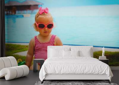 cute little girl play with toys on tropical beach Wall mural