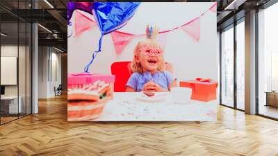 cute little girl with presents at birthday party Wall mural