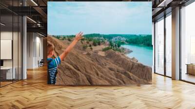 happy boy travel in nature, kid looking at scenic landscape Wall mural