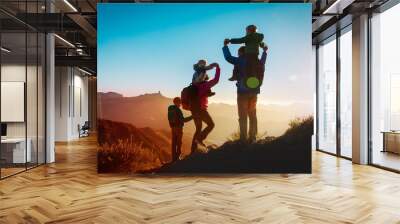 happy family travel in mountains at sunset Wall mural