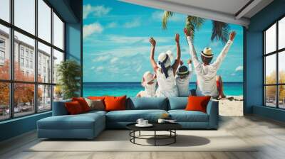 happy family with two kids hands up on beach Wall mural