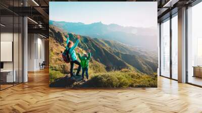 happy mother and daughter enjoy travel in mountains Wall mural