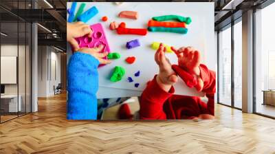 kids play with clay molding shapes, learning through play Wall mural