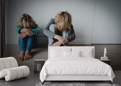 sad stressed tired exhausted boy and girl at home Wall mural