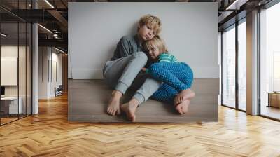 sad stressed tired exhausted boy and girl at home Wall mural