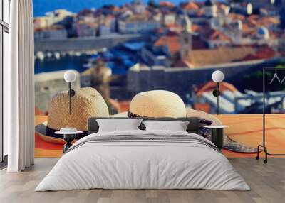 two hats on vacation in europe, romantic travel Wall mural