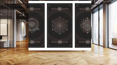 Vector set of three dark backgrounds with sacred symbols, grunge textures and frames. Illustration in black and gold colors. Wall mural