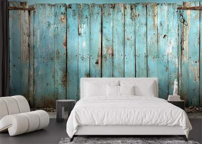   A blue wooden fence with peeling paint and two rusted metal hooks - one on top, one on bottom Wall mural