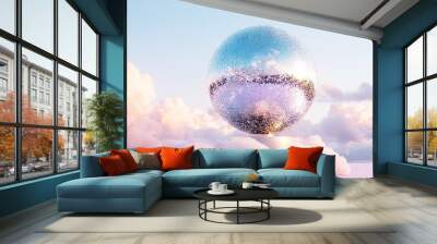  A gigantic mirror ball perched atop fluffy clouds amidst a bright blue sky dotted with white clouds Wall mural