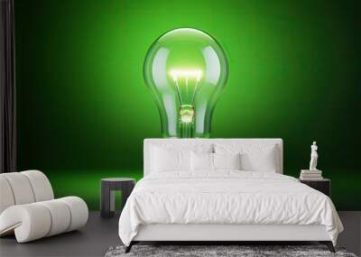  a green light bulb sitting on top of a green floor in front of a green wall with a light bulb on top of it. Wall mural