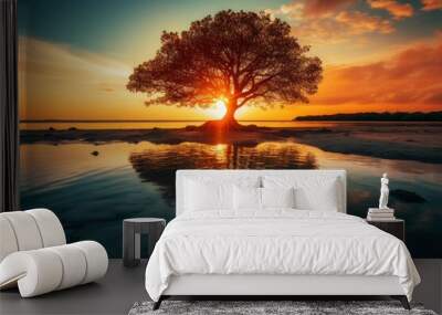  a tree in the middle of a body of water with the sun setting in the background and clouds in the sky. Wall mural