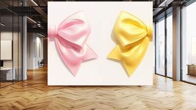 Two pink and yellow silk bows with tails isolated on white background Wall mural