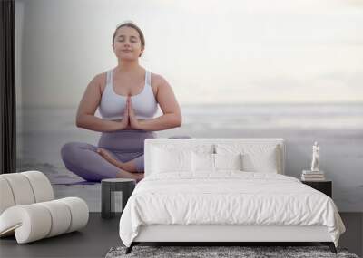 Yoga meditation zen, beach and woman meditate for spiritual mental health, chakra energy balance or soul healing. Nature mockup, freedom peace and plus size girl with mindfulness, mindset or wellness Wall mural