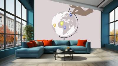 A round Globe on a metal stand with location pin stickers on it, educational and travel concept Wall mural